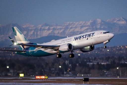 A westJet airplane takes off in Calgary, Alta