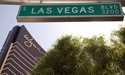 The Wynn Las Vegas is framed under a Las Vegas Boulevard street sign, Tuesday, April 19, 2011, in L…