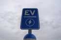 A sign is displayed at an electric vehicle charging station, March 8, 2024, in London, Ohio