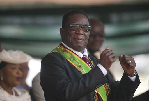 Zimbabwe President Emmerson Mnangagwa gestures during his inauguration ceremony at the National Spo…