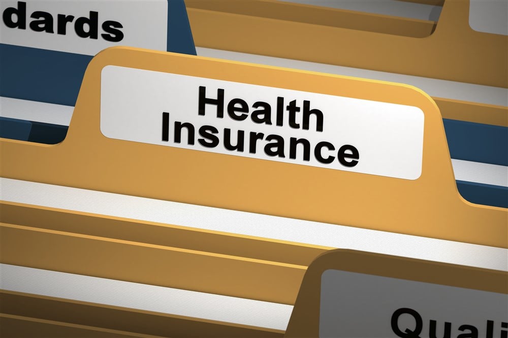 image of folder with file displaying health insurance tab