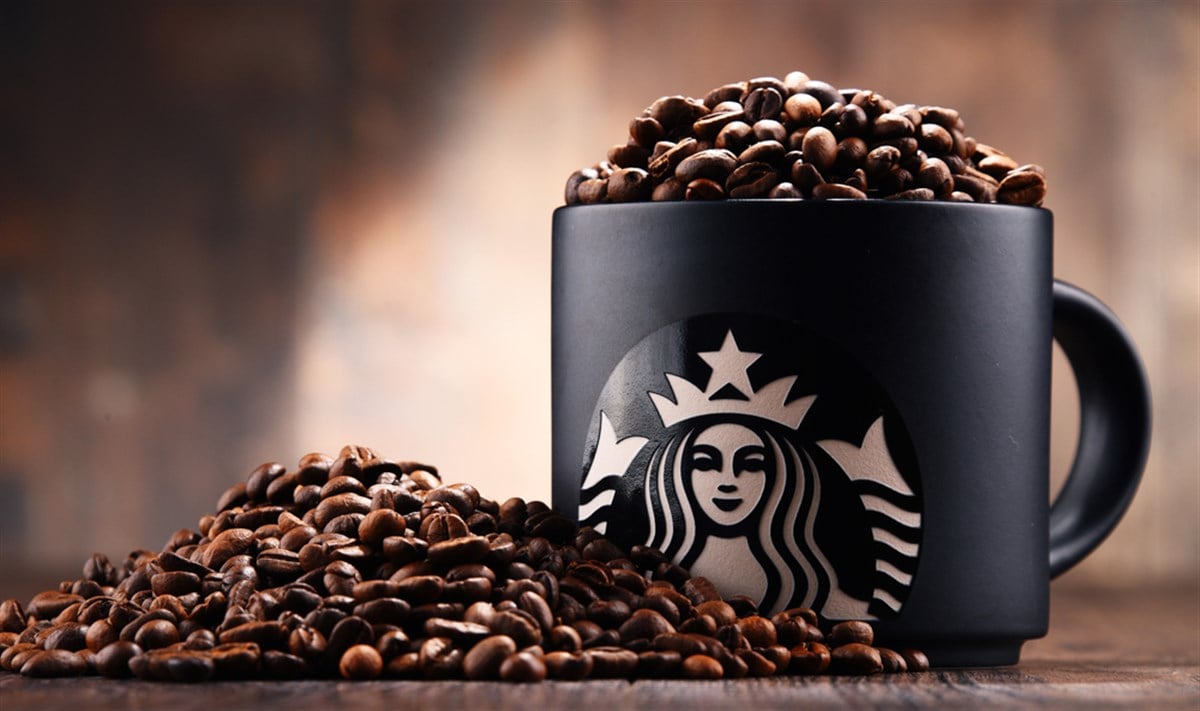 Composition with cup of Starbucks coffee - Stock Editorial Photography