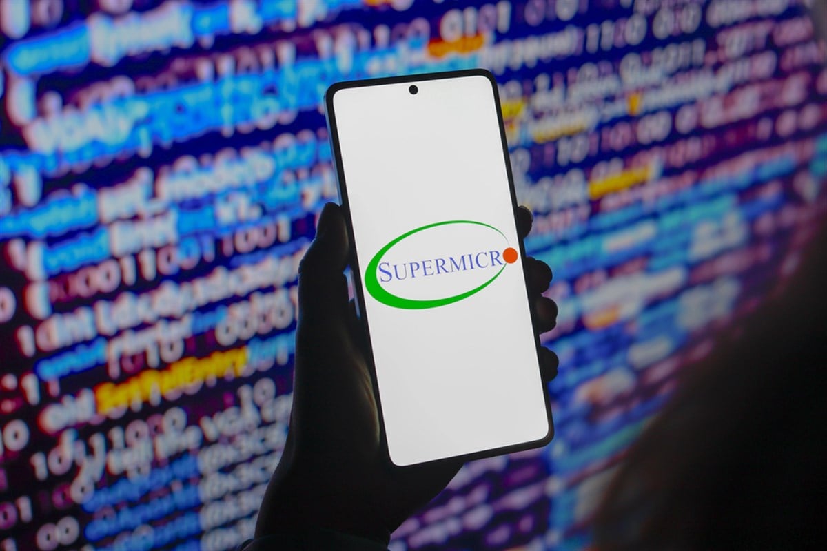 the Super Micro Computer, Inc. logo is displayed on a smartphone screen