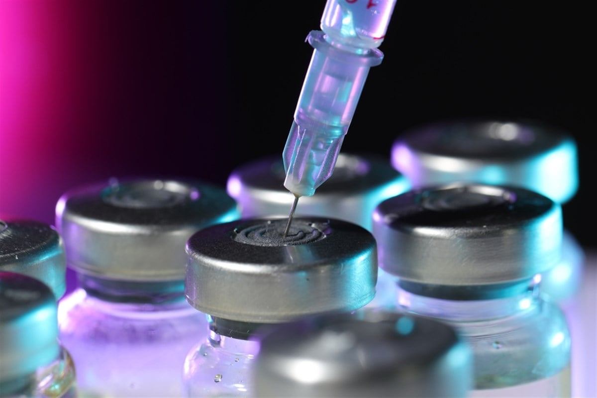 vaccine vials and syringe