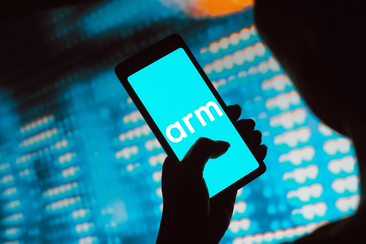 the Arm Holdings logo is displayed on a smartphone screen