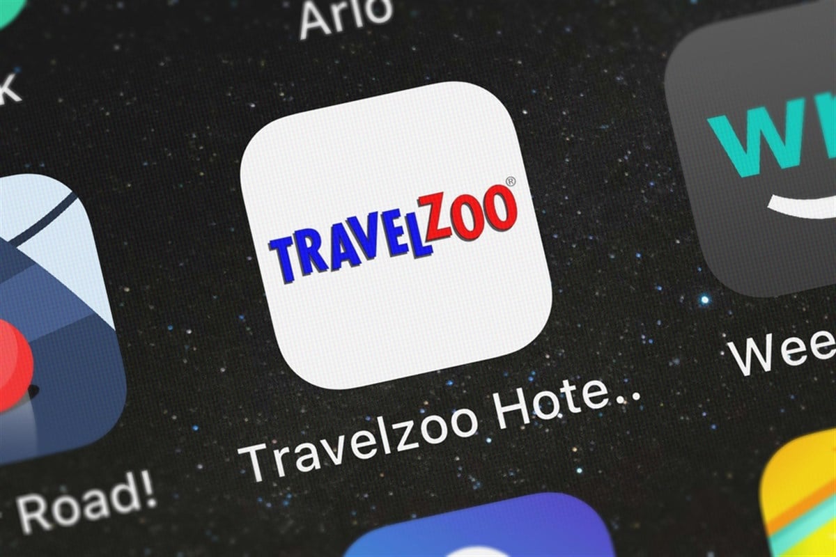 London, United Kingdom - September 30, 2018: The Travelzoo Hotel  Travel Deals mobile app from Travelzoo Inc. on an iPhone screen.