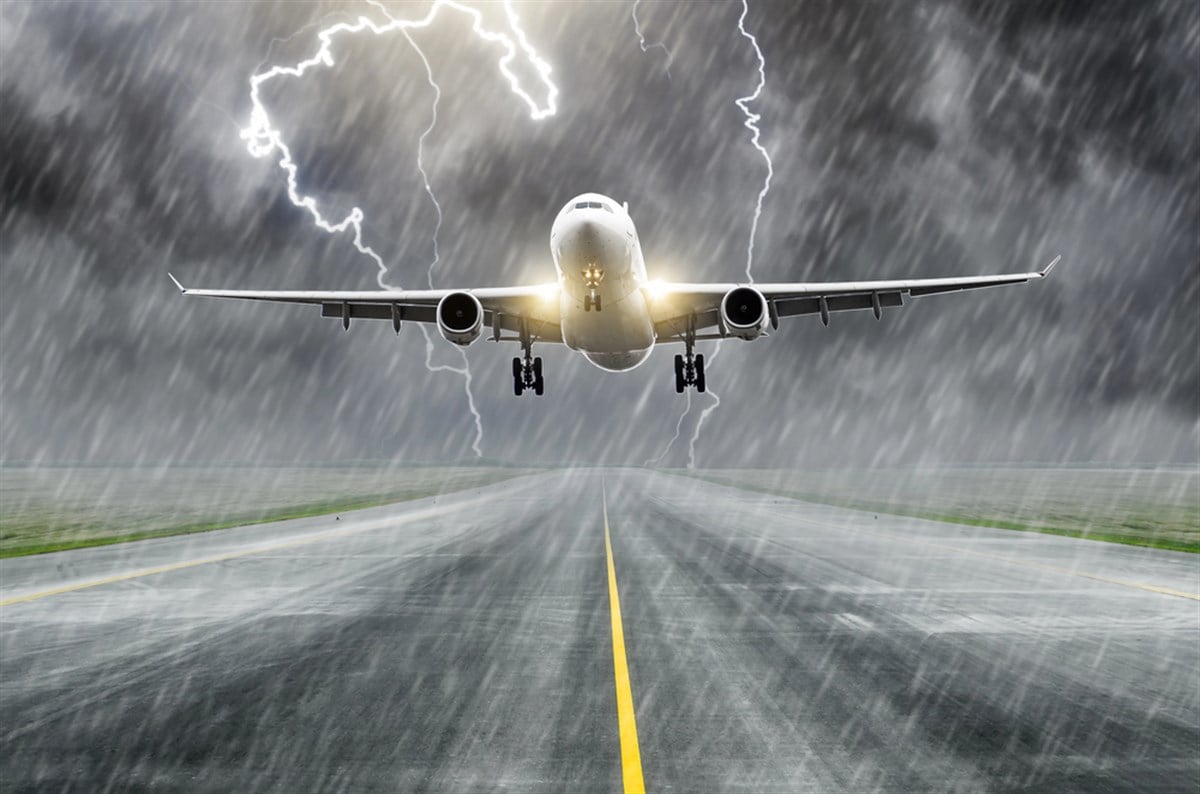 Lightning strike on an airplane electric discharge during a thunderstorm on landing at the airport — Photo