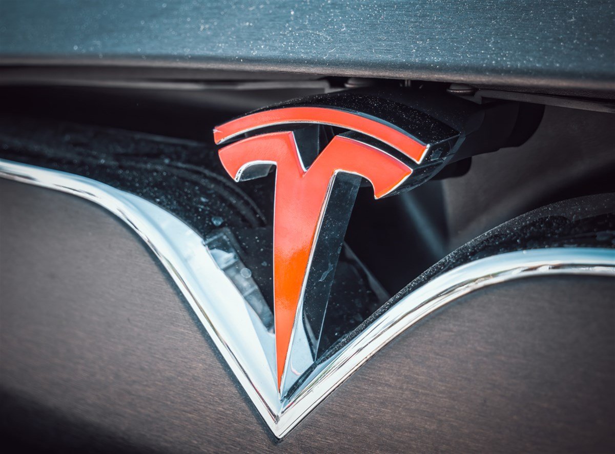 Bucharest, Romania - 05.20.2022: Close up with the logo of the famous american luxury electric car brand Tesla