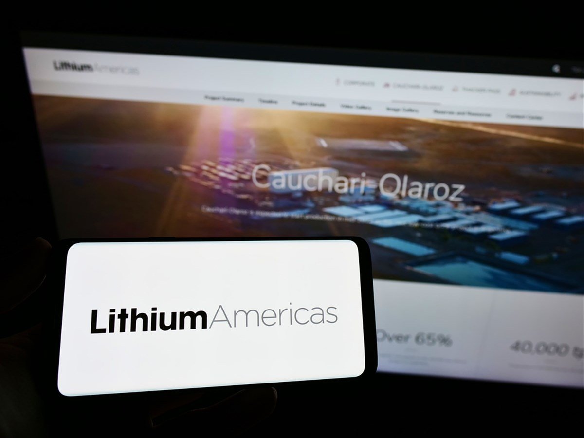 STUTTGART, GERMANY - Jun 22, 2021: Person holding cellphone with logo of Canadian company Lithium Americas Corp. on screen in front of business webpage. Focus on phone display. - Stock Editorial Photography