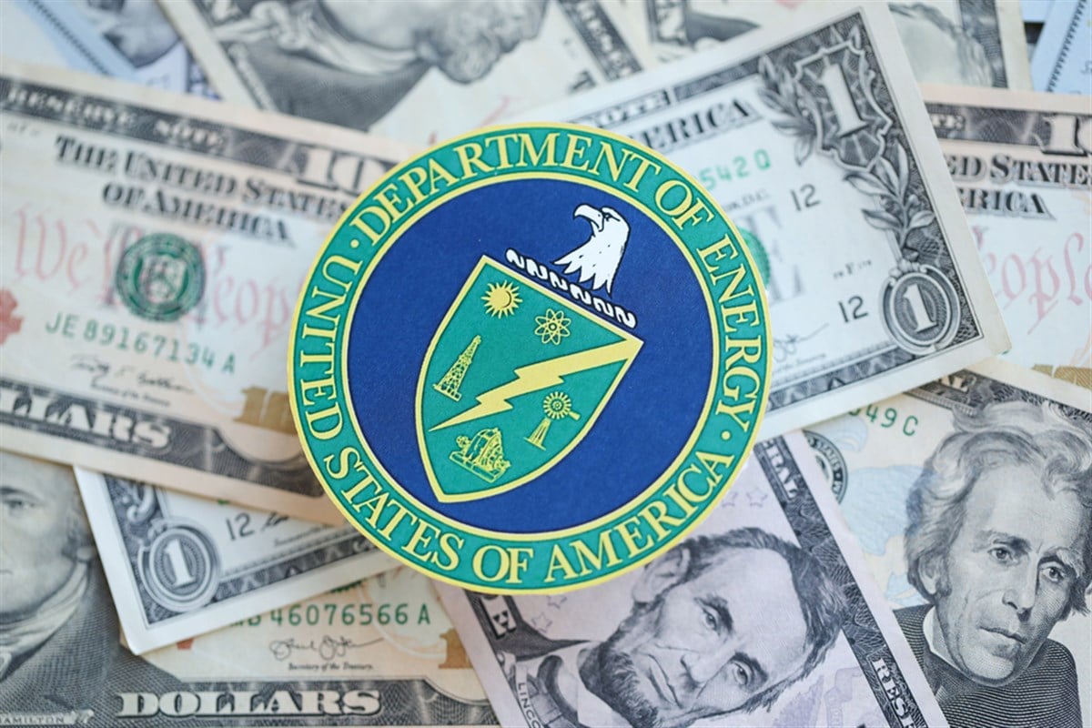 KYIV, UKRAINE - MARCH 9, 2024 US Department of Energy seal on many US dollar bills close up