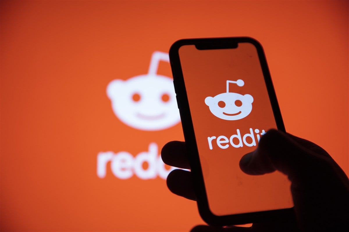 LONDON, UK - February 2021: Reddit logo displayed on a smartphone device.