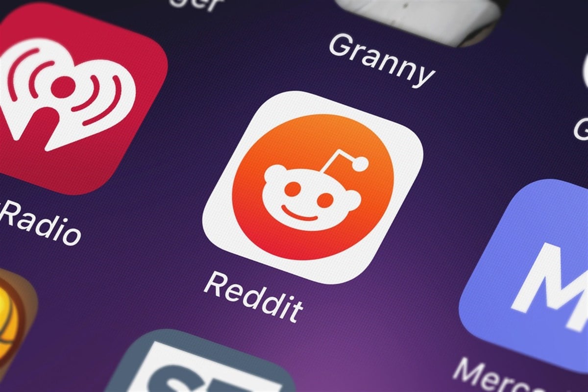 London, United Kingdom - September 29, 2018: Close-up shot of reddit's popular app Reddit: Trending News.