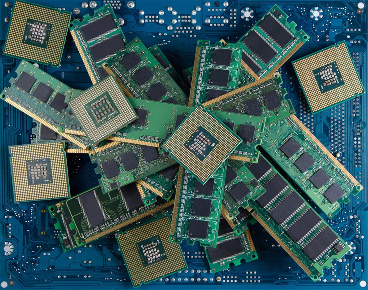 Random access memory and processors on motherboard - stock image