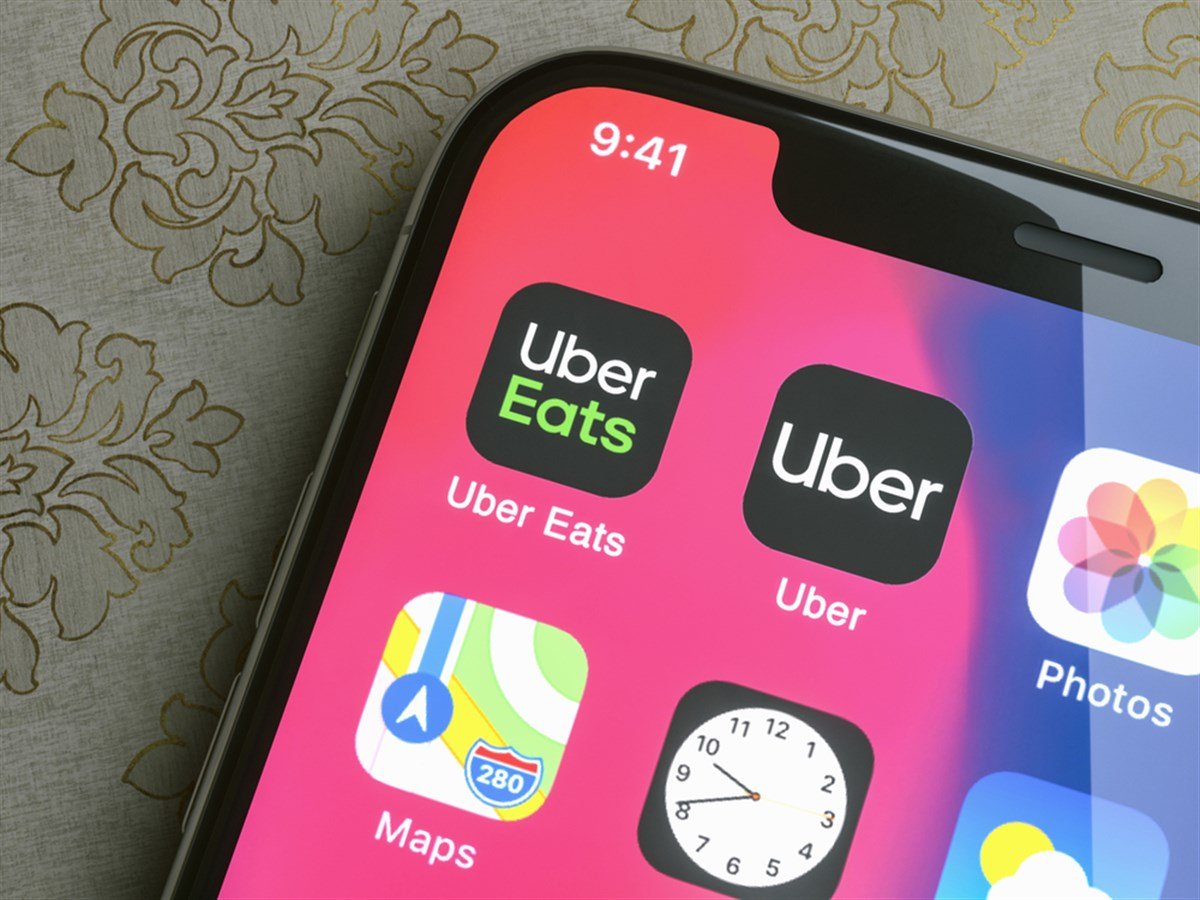 Aachen, Germany - January 18 2020: Apple iphone with Uber and Uber Eats App on screen. Uber is an American company offering different transportation services online