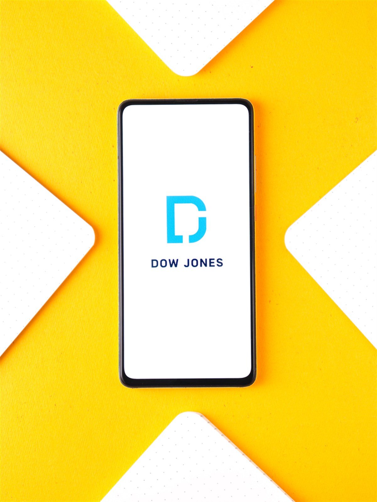 Assam, india - September 12, 2020 : Dow jones logo on phone screen stock image. - Stock Editorial Photography