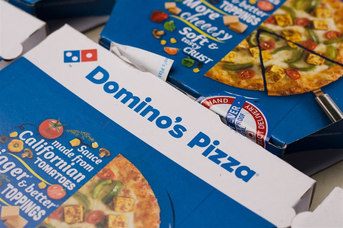 West Bangal, India - August 21, 2021 : Dominos pizza on box stock image. - Stock Editorial Photography