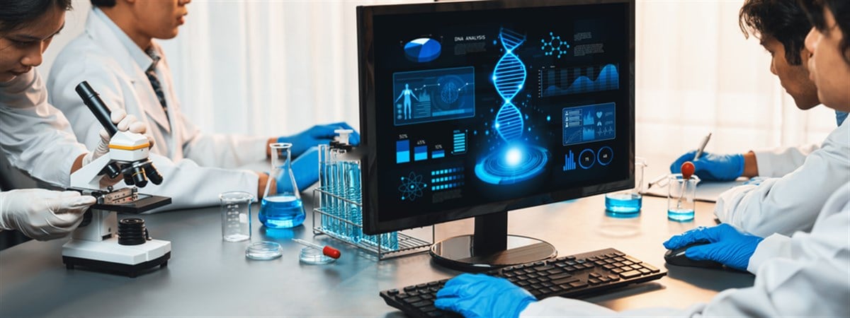 Dedicated scientist group working on advance biotechnology computer software to study or analyze DNA data after making scientific breakthrough from chemical experiment on medical laboratory. Neoteric