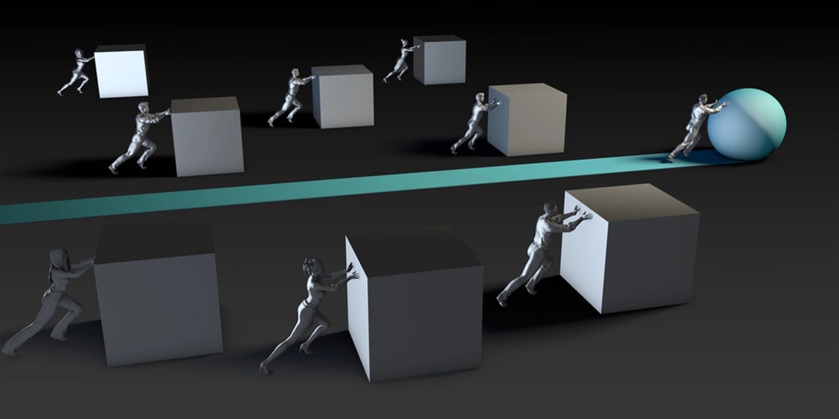 Photo of gray figures pushing gray blocks, with the one in the lead pushing a blue ball; disruptive innovation concept