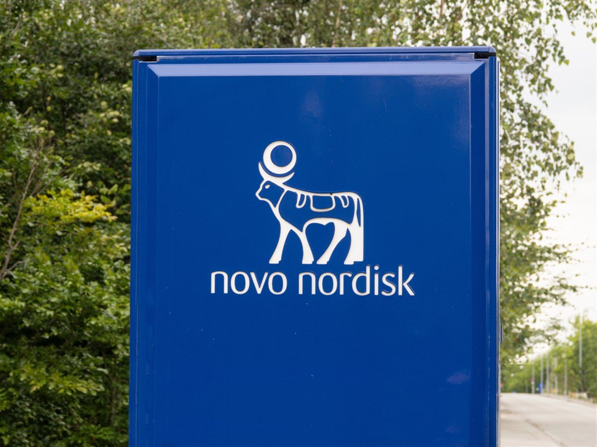 Signpost with logotype at Novo Nordisk corporate headquarters. A pharmaceutical company headquartered in Denmark. Copenhagen, Denmark - august 12, 2023. — Stock Editorial Photography