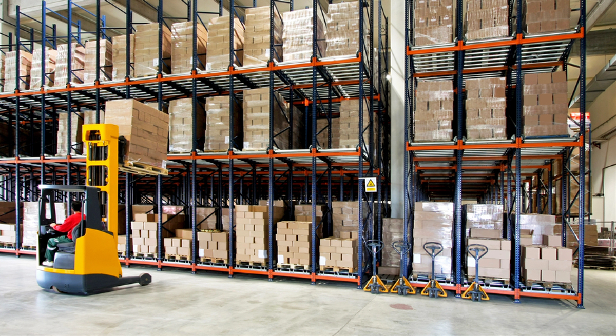 Photo of a forklifter in a warehouse