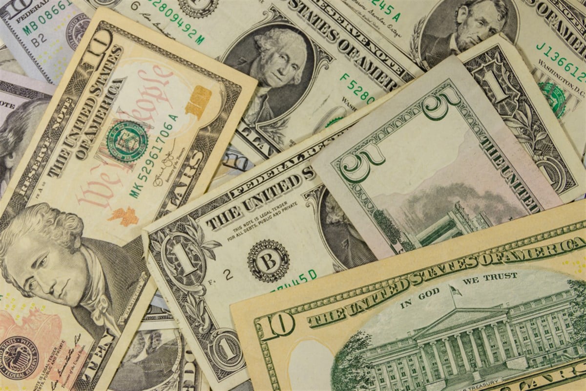 Background of different dollar banknotes — Stock Editorial Photography