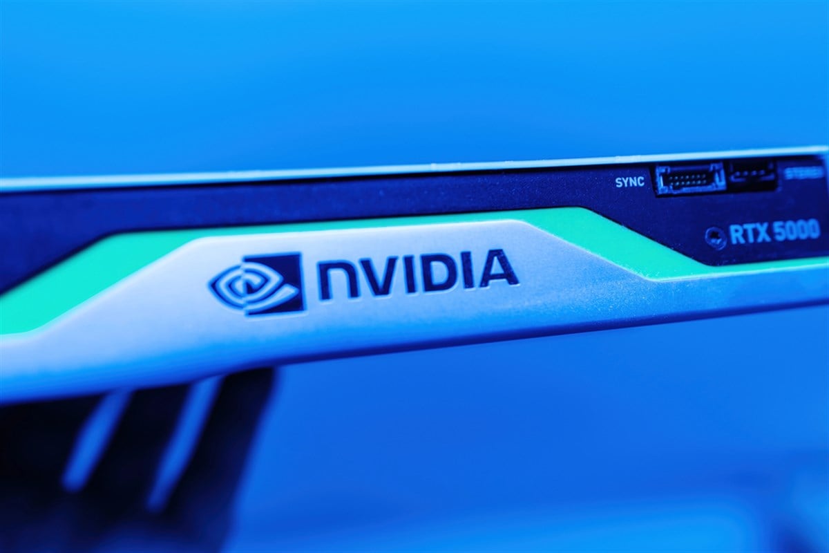 Paris, France - Apr 3, 2024: The NVIDIA logo is visible on a super professional video card with a blue color cast, highlighting the advanced technology and premium design of the hardware — Stock Editorial Photography