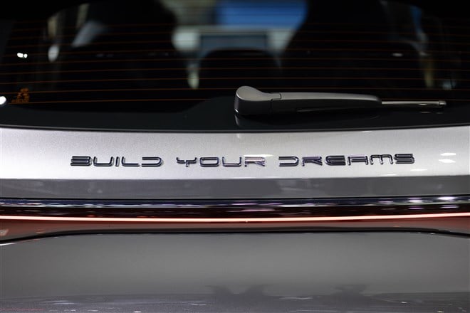 closeup photo of build your dreams BYD logo on vehicle