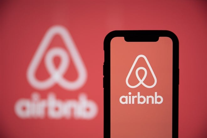 Is Airbnb a buy on fee increase, international growth?