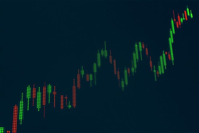 Stock Exchange screen with red, green candle stick chart moving up. Index or equity chart. Stock market data, analyzing, investment concept.