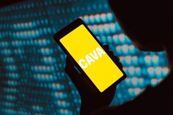 Cava Group, Inc. logo is displayed on a smartphone screen
