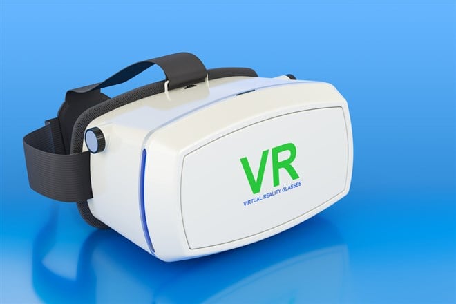 Virtual reality glasses on blue backdrop