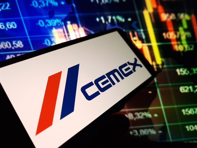 Cemex logo on smartphone stock market background