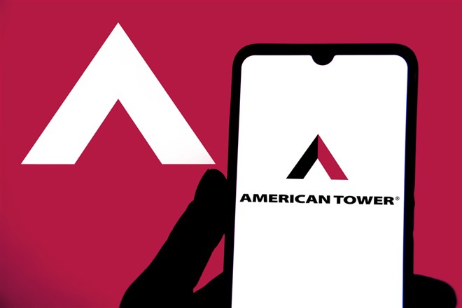 Smartphone with logo of US infrastructure company American Tower Corp.