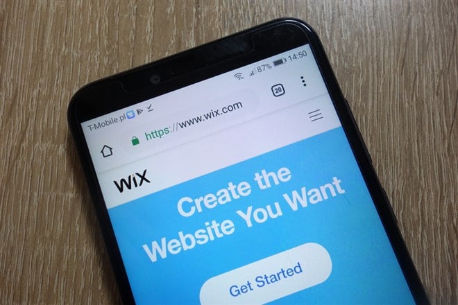 Wix website (www.wix.com) displayed on smartphone