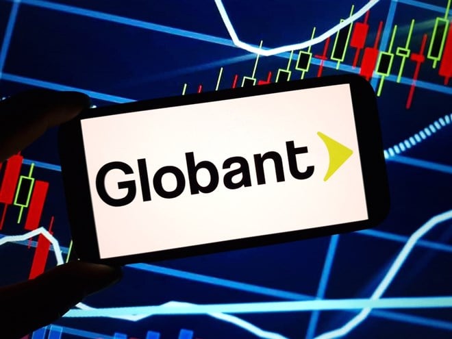 Globant logo on smartphone with stock market background