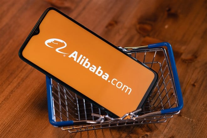 Alibaba logo on the screen smartphone. Alibaba Group Holding Limited is a Chinese multinational technology company specializing in e-commerce, retail, Internet.