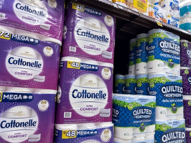 Seattle, WA USA - circa November 2022: Close up view of large bundles of toilet paper for sale inside a QFC grocery store.