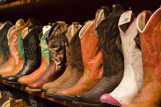 cowboy boots shelf in store Boot Barn