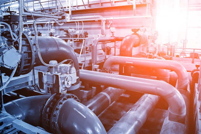 Pipes and sewage pumps inside modern industrial wastewater treat — Photo