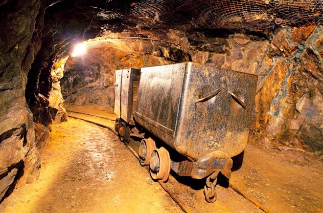 Underground train in mine, carts in gold, silver and copper mine — Photo