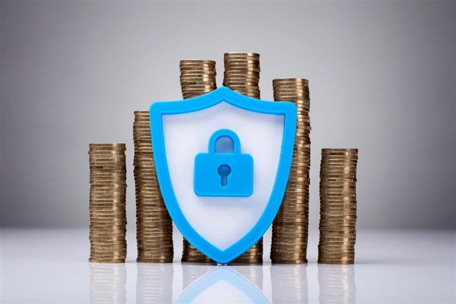 Security Symbol With Stacked Coins Over Grey Background — Photo