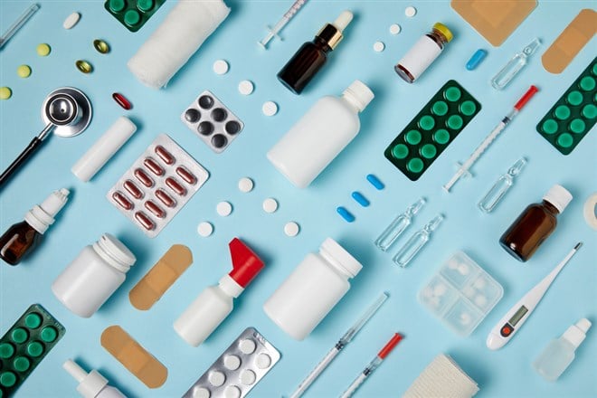 Full frame shot of composed various medical supplies on blue surface — Photo