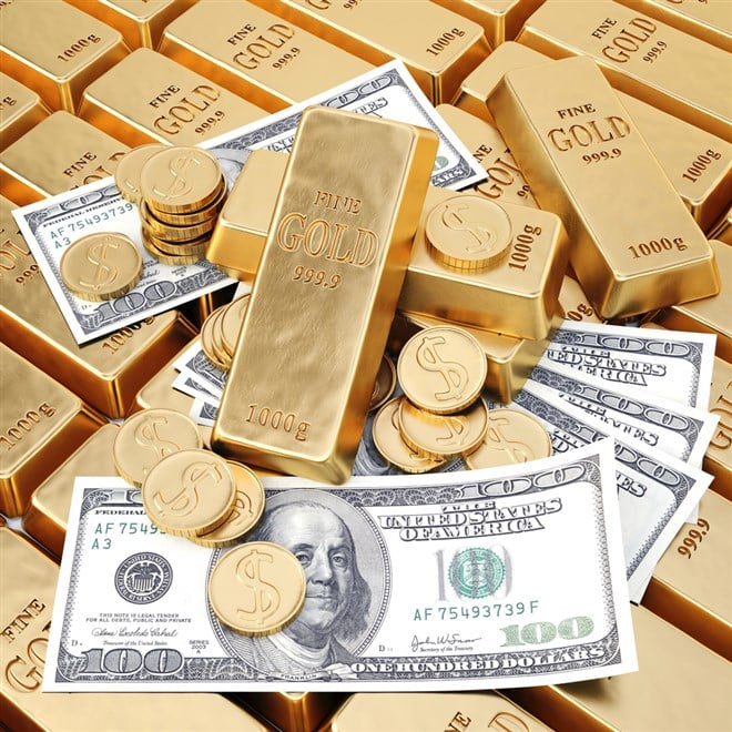 Gold bars and coins with 100 bill