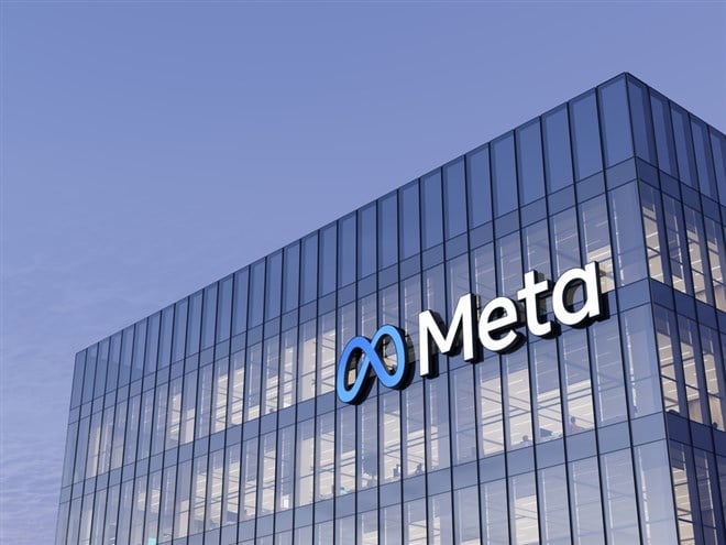 Meta Signage Logo on Top of Glass Building. Metaverse Workplace Technology Service Company High-rise Office Headquarters.