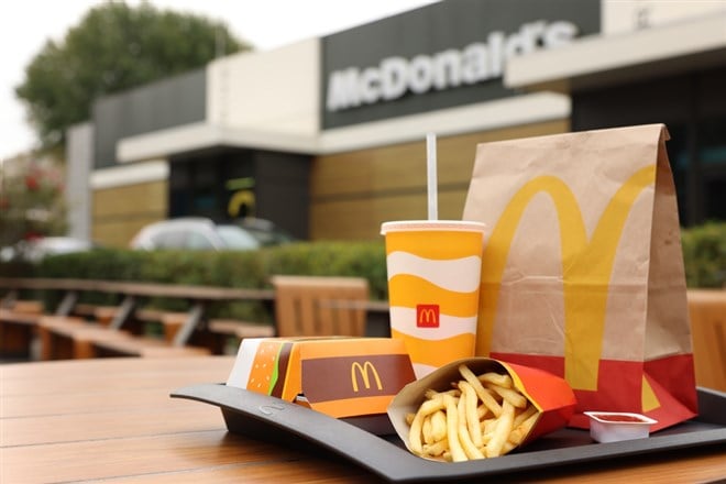 Lviv, Ukraine - October 9, 2023: McDonald's menu on wooden table outdoors, space for text — Photo