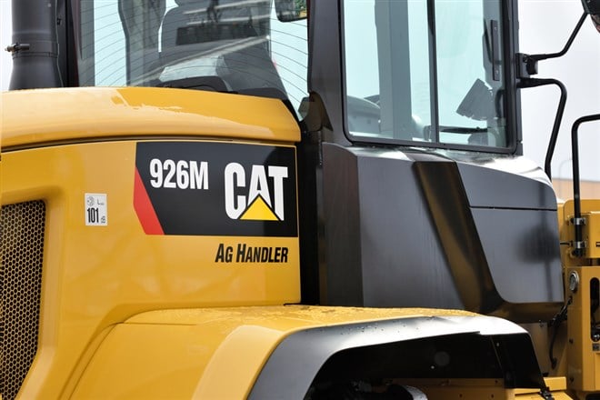 Caterpillar heavy duty equipment vehicle and logo - Stock Editorial Photography