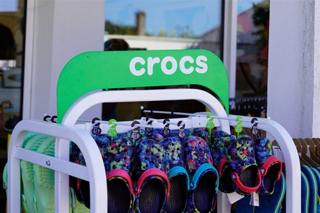 Bordeaux , Aquitaine  France - 07 20 2022 : crocs text sign and logo brand American footwear company store foam clog plastic shoes shop