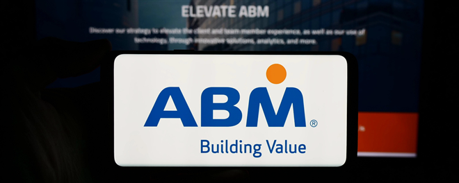 Stuttgart, Germany - 03-13-2024: Person holding cellphone with logo of US facility management company ABM Industries Inc. in front of business webpage. Focus on phone display. — Stock Editorial Photography