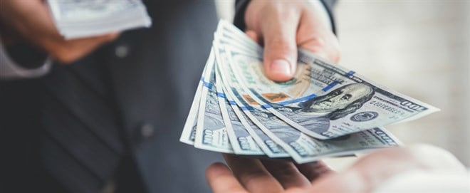 Businessman giving or paying money, US dollar bills - web banner — Photo