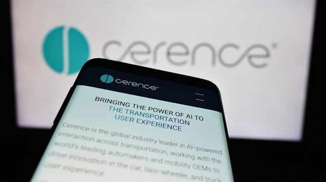 Stuttgart, Germany - 07-06-2024: Smartphone with website of US automotive software company Cerence Inc. in front of business logo. Focus on top-left of phone display. — Stock Editorial Photography